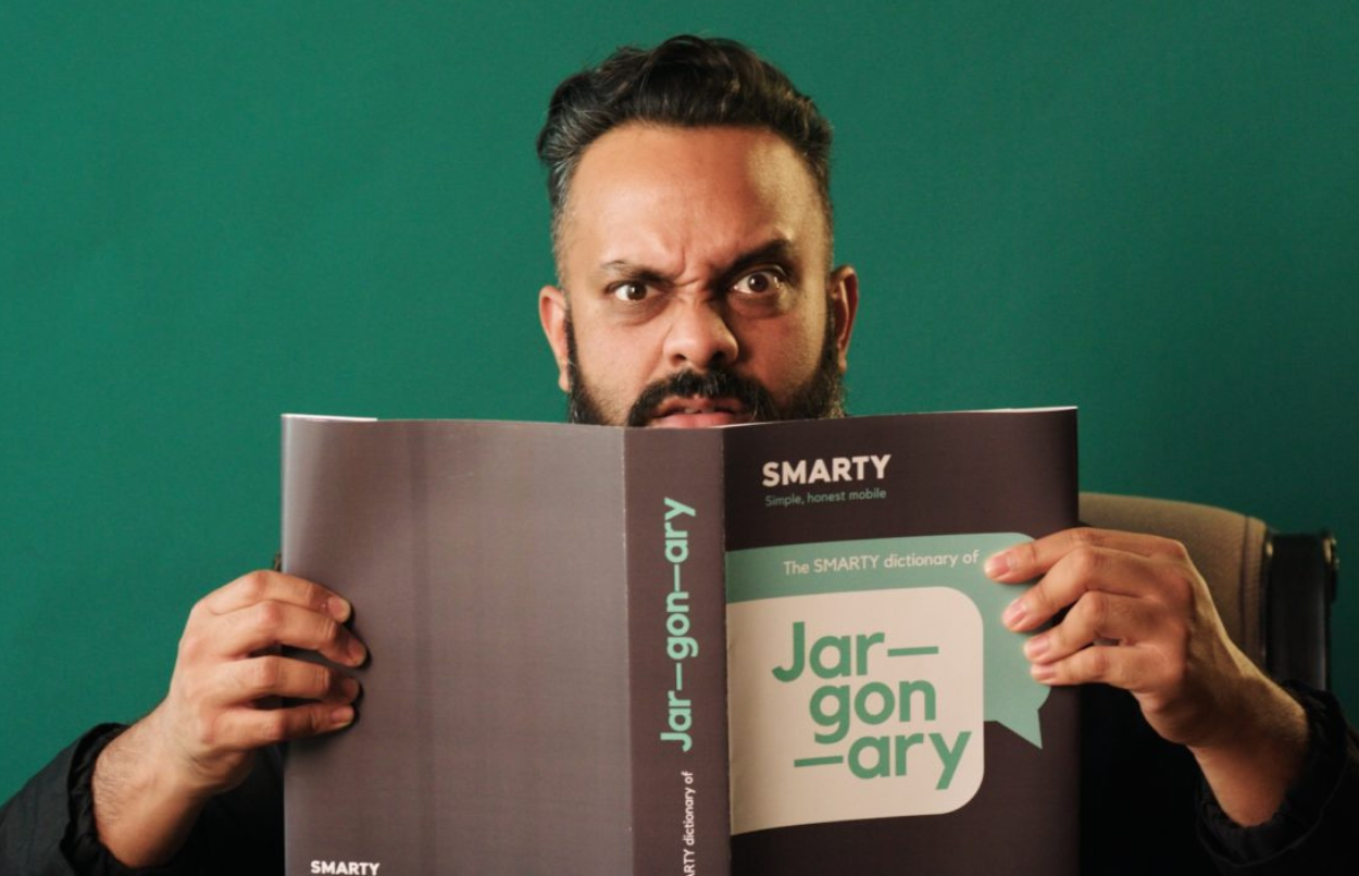 Guz Khan with a book